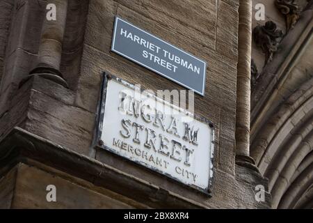 Glasgow, UK, 6th June 2020. Activists of the Celtic FC Green Brigade (ultra-fans) have renamed streets in the Merchant City which commemorate the historical fathers of the city, who had connections with plantations and slavery, with the names of black civil rights activists and slaves, in a protest aimed at drawing attention to Glasgow's connections to slavery. Ingram Street, named after 18th century tobacco lord Archibald Ingram, renamed Harriet Tubman Street after the American abolitionist and political activist who had been born into slavery. In Glasgow, Scotland, on 6 June 2020. Photo cred Stock Photo