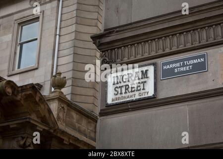 Glasgow, UK, 6th June 2020. Activists of the Celtic FC Green Brigade (ultra-fans) have renamed streets in the Merchant City which commemorate the historical fathers of the city, who had connections with plantations and slavery, with the names of black civil rights activists and slaves, in a protest aimed at drawing attention to Glasgow's connections to slavery. Ingram Street, named after 18th century tobacco lord Archibald Ingram, renamed Harriet Tubman Street after the American abolitionist and political activist who had been born into slavery. In Glasgow, Scotland, on 6 June 2020. Photo cred Stock Photo