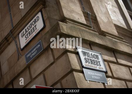 Glasgow, UK, 6th June 2020. Activists of the Celtic FC Green Brigade (ultra-fans) have renamed streets in the Merchant City which commemorate the historical fathers of the city, who had connections with plantations and slavery, with the names of black civil rights activists and slaves, in a protest aimed at drawing attention to Glasgow's connections to slavery. Glassford Street, named after 18th century tobacco lord John Glassford, renamed Fred Hampton Street after the American activist and revolutionary socialist, and Wilson Street, named after 18th century tobacco lord James Wilson, renamed Stock Photo