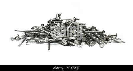 Pile of silver metallic nails isolated on white background. Stock Photo