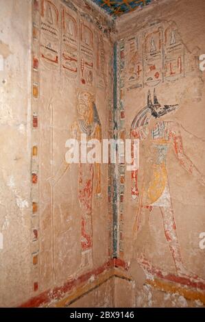 Hieroglypic carvings and paintings on interior wall at the ancient egyptian temple of hatshepsut in Luxor Stock Photo