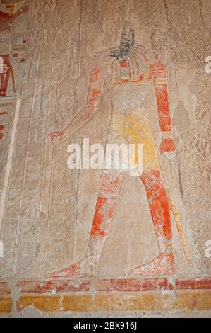 Hieroglypic carvings and paintings on interior wall at the ancient egyptian temple of hatshepsut in Luxor Stock Photo