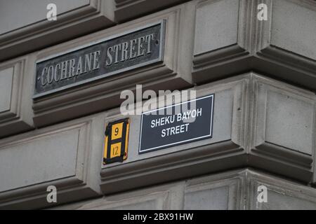 A sign alternatively naming Cochrane Street 'Sheku Bayoh Street' in Glasgow. Activists have put up names of black people and civil rights activists throughout history alongside street names around the Scottish centre as part of the ongoing worldwide demonstrations following the death of George Floyd who was killed on May 25 while in police custody in the US city of Minneapolis. Stock Photo