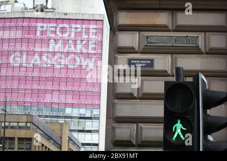 A sign alternatively naming Cochrane Street 'Sheku Bayoh Street' in Glasgow. Activists have put up names of black people and civil rights activists throughout history alongside street names around the Scottish centre as part of the ongoing worldwide demonstrations following the death of George Floyd who was killed on May 25 while in police custody in the US city of Minneapolis. Stock Photo