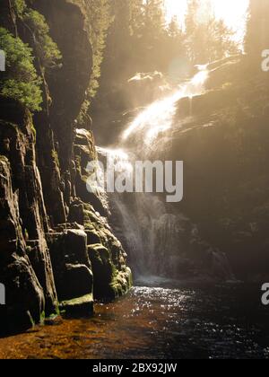 Kamienczyk waterfall near SzklarskaPoreba in Giant mountains or Karkonosze, Poland. Long time exposure. Stock Photo