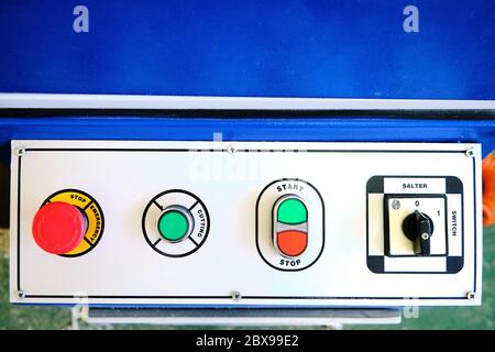 Machine control panel with buttons and switches Stock Photo