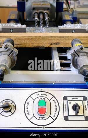 Industrial machine with control panel buttons and switches Stock Photo