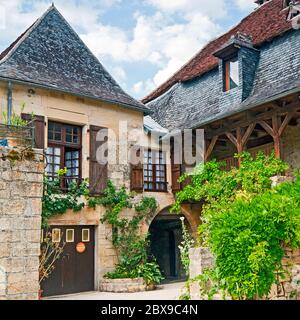 Medieval freestone house in Saint-Robert in the Correze, France Stock Photo