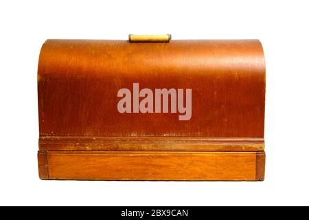Old retro vintage suitcase for a sewing machine on a white background isolate Stock Photo
