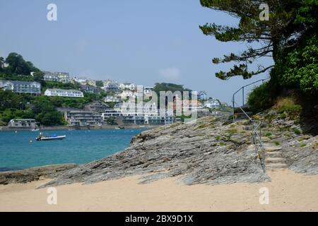 Mill Bay Beach at East Portlemouth, looking towards Salcombe town and estuary on a bright summer's day. Stock Photo