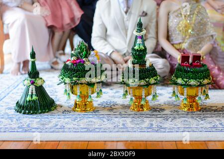 Trays of wedding gifts and betel bowls from groom to bride's family, Khan Mak procession, Thai wedding engagement ceremony Stock Photo