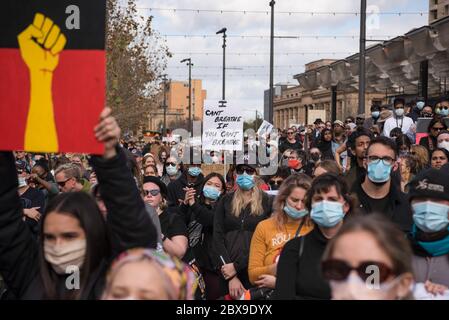Adelaide, Australia. 06th June, 2020. Protesters gather while wearing face masks during the demonstration. Thousands of protesters gathered at Adelaide's Victoria Square demonstrating in support of the Black Lives Matter movement and against Aboriginal Australian deaths in custody. Sparked by the death of African American George Floyd at the hands of a white police officer in the US state of Minneapolis, protests were observed in all major Australian cities. Credit: SOPA Images Limited/Alamy Live News Stock Photo