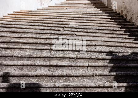 Closeup of a staircase with old stone steps - Background. Trentino Alto Adige, Italy, Europe Stock Photo