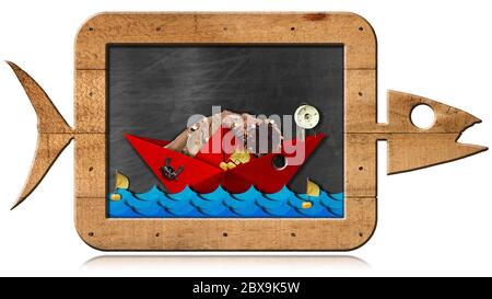 Blackboard with wooden frame in the shape of fish with a red fishing boat, blue waves and copy space. Isolated on white background Stock Photo