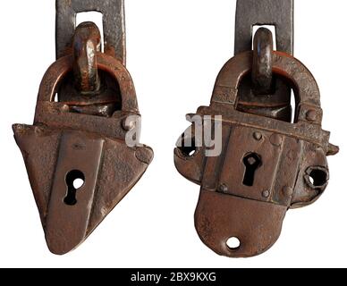 Close-up of two ancient rusty padlocks with keyhole isolated on white background Stock Photo
