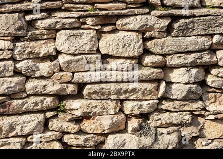 Closeup of a typical dry stone wall in the countryside, Veneto region, Italy, Europe Stock Photo