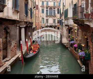 A gondola moored on the rio dei Bareteri canal seen from Ponte dei Bareteri, Venice, Itally Stock Photo