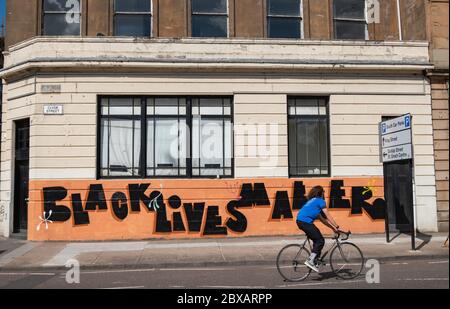 Glasgow, Scotland, UK. 6th June, 2020. Graffiti writing on the wall of a building on Clyde Street saying Black Lives Matter. Credit: Skully/Alamy Live News Stock Photo