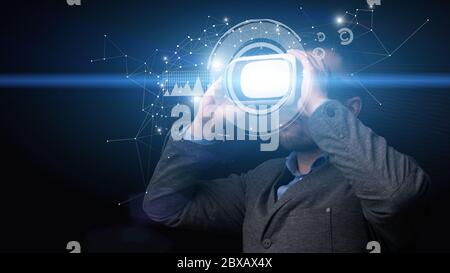 Bearded businessman using virtual reality glasses for work Stock Photo