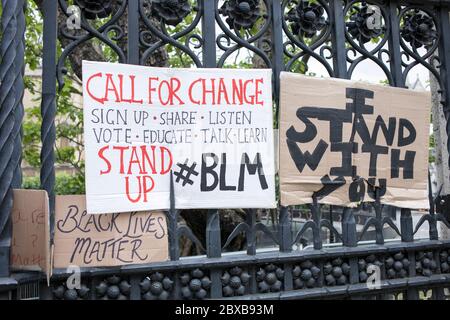Placards are displayed on the Houses of Parliament railings during the rally in London, UK, against racism and the killing of George Floyd in US. Stock Photo