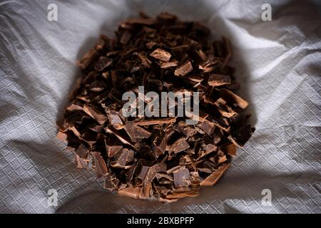 Pile of chopped chocolate. Top view. Stock Photo