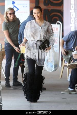 Kim Kardashian grabs a drink and some snacks from a health food shop, Calabasas, California. 2011 Stock Photo