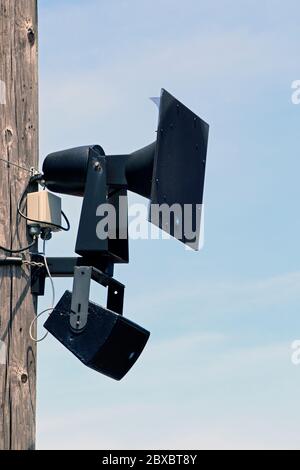 A loudspeaker attached to a telephone pole on the boardwalk in Cape May, New Jersey, USA Stock Photo