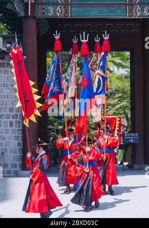 Korean Royal Guard marching in front of palace Stock Photo