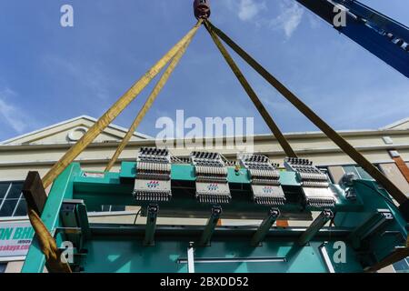 Kota Kinabalu, Sabah, Malaysia - August 28, 2017 : Embroidery Machine on lorry crane are ready to loading at Kota Kinabalu, Sabah, Malaysia Stock Photo