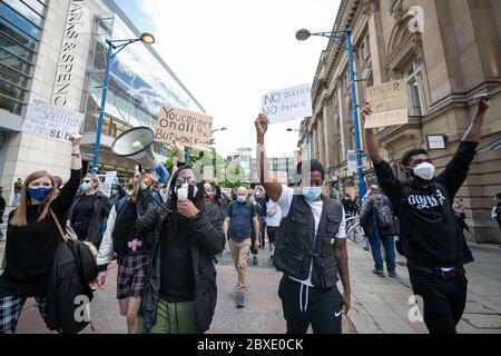 Manchester, UK. 06th June, 2020. Protesters march through the streets during the demonstration.Thousands of people attend the most recent 'Black Lives Matter' protest in Manchester's city centre following the death of George Floyd in the USA. Credit: SOPA Images Limited/Alamy Live News Stock Photo