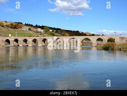 Dicle Bridge is situated in Turkey's Diyarbakir. The bridge was built in 1065. Stock Photo