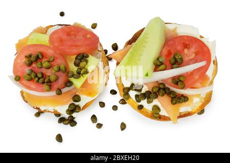 Bagel and Lox with Cream Cheese, Tomato, Onion, Cucumber, Capers with Clipping Path Stock Photo