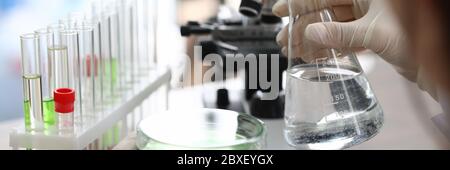 Chemical experience in laboratory, water sample. Stock Photo