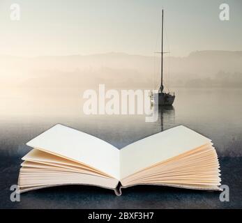 Digital composite concept image of open book wth Beautiful unplugged landscape image of sailing yacht sitting still in calm lake water in Lake Distric Stock Photo