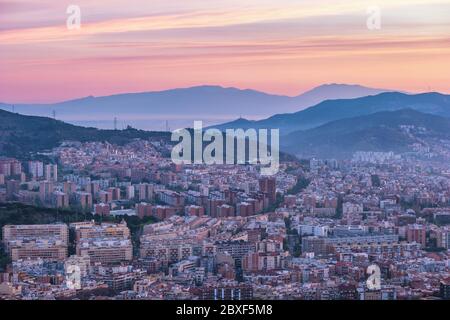 Barcelona Spain, high angle view sunrise city skyline from Bunkers del Carmel Stock Photo