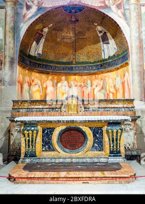 Altar and mosaic in the chapel of Saints Primo and Feliciano in the Basilica di Santo Stefano Rotondo al Celio - Rome. Italy Stock Photo