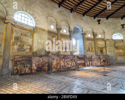 Walls decorated with frescoes portraying scenes of martyrdom in the Basilica di Santo Stefano Rotondo al Celio - Rome. Italy Stock Photo