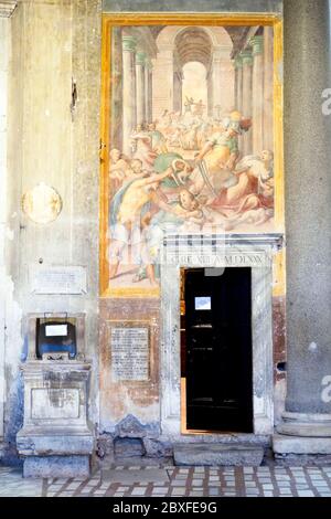 Walls decorated with frescoes portraying scenes of martyrdom in the Basilica di Santo Stefano Rotondo al Celio - Rome. Italy Stock Photo