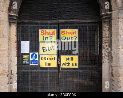 Willingham Cambridgeshire, UK. 7th June, 2020. The village church is closed during the coronavirus and covid-19 lockdown with signs on the locked doors. The Goverment plans to reopen places of worship in the UK for private prayer on 15th June. Credit: Julian Eales/Alamy Live News Stock Photo
