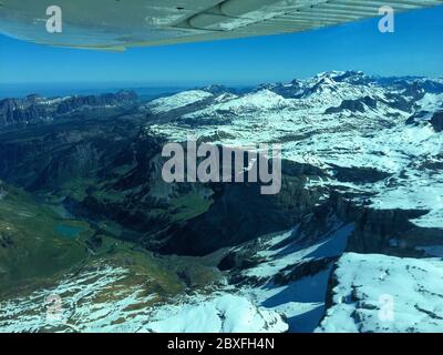 Snow covered mountain peaks in Switzerland Stock Photo