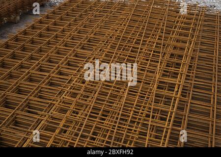 Steel reinforcing mesh ready for use on a building site. Stock Photo