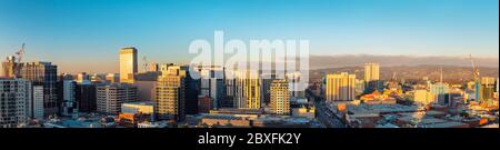 Adelaide, South Australia - June 5, 2020: Adelaide city business district rooftop skyline at sunset viewed towards east Stock Photo