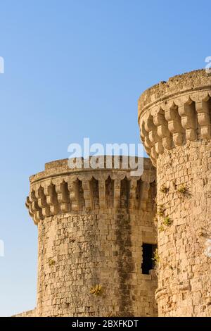 The defensive tower turrets of the Marine Gate fortification in medieval Rhodes Town, Rhodes, Dodecanese, Greece Stock Photo