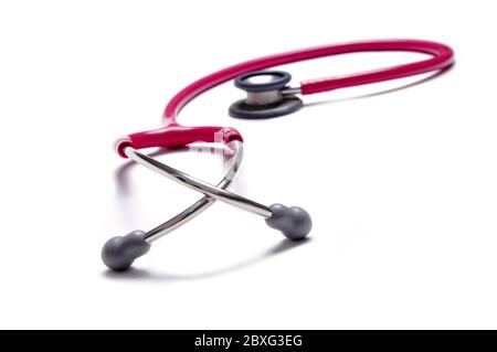 Pink colour stethoscopes isolated on white background Stock Photo - Alamy