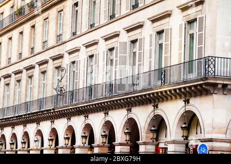 Parisian buildings in the historic district of Rue des Pyramides along Rue di Rivoli, Paris, France. Stock Photo