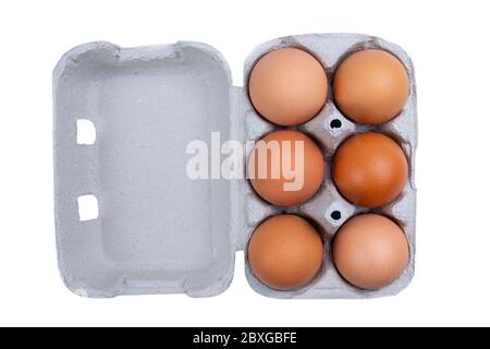 Isolated egg box package on white with lid and six brown eggs. Stock Photo