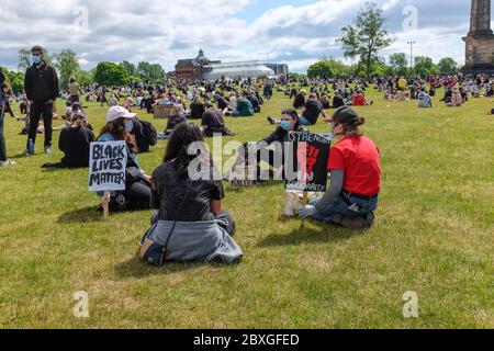 Glasgow, UK. 07th June, 2020. Thousands of people turned out at Glasgow Green, Glasgow, UK to demonstrate is solidarity with those in other countries against descrimination with the phrase 'Black Lives Matter', a political movement that began in America with the death of George Floyd. The rally was organised by BARRINGTON REEVES and there was the guest speaker CELESTE MORNINGSIDE, from Fort Lauderdale, USA, a prominent equality activist. Credit: Findlay/Alamy Live News Stock Photo