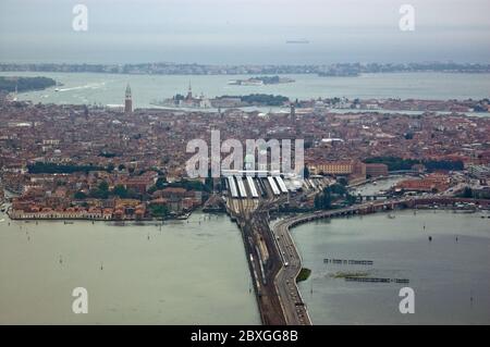 Venice, Italy as seen from the air. The road and rail link from Piazzale Roma and the railway station actoss the Ponte della Liberta to the mainland i Stock Photo