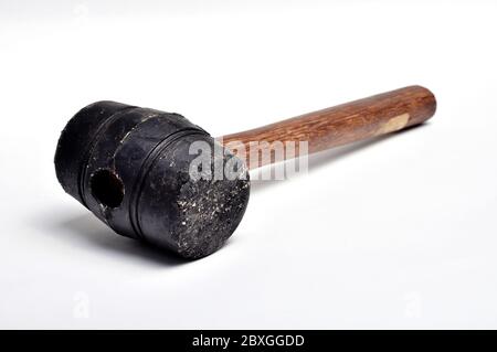 A rubber mallet is a handy tool for assembling woodworking projects when you want to avoid damaging the surface. Stock Photo