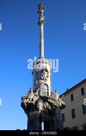 Triumph of Saint Raphael (Triunfo de San Rafael de la Puerta del Puente) tall statue in Cordoba Andalusia Spain Stock Photo